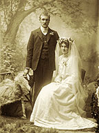 Photograph of a couple at their wedding.