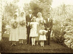 Photograph of a wedding group. 